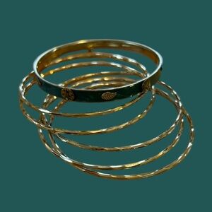 set of 6 bangles - 5 gold color, 1 green and gold